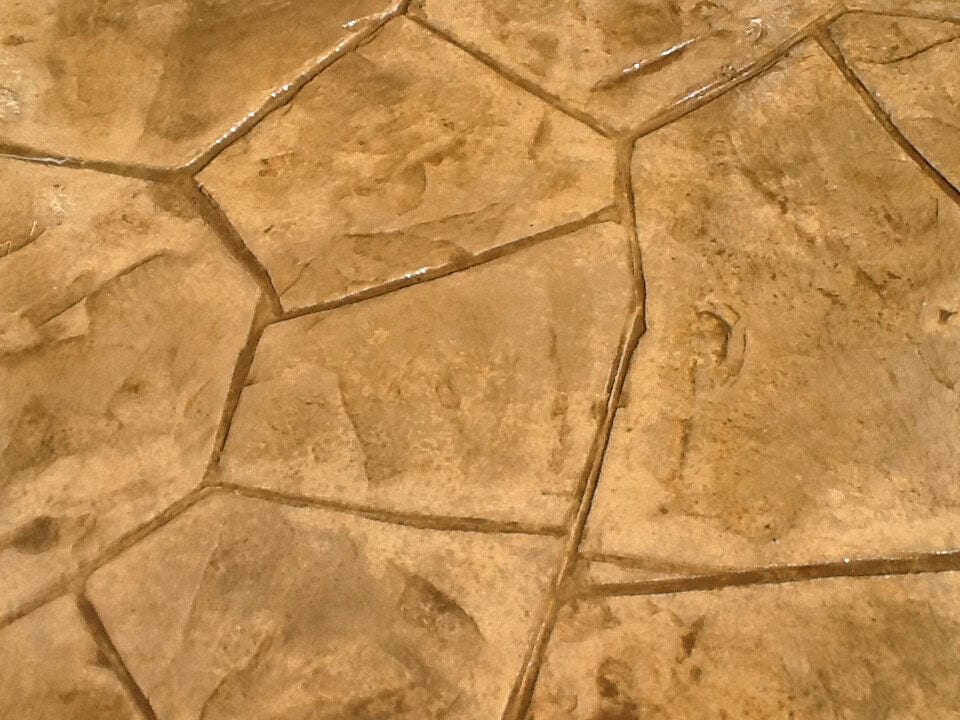 Close-up of decorative stamped concrete pattern by Collin County Concrete