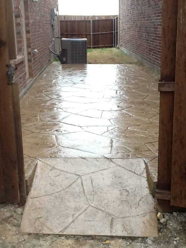 Stamped concrete stonework patio walkway in Collin County TX