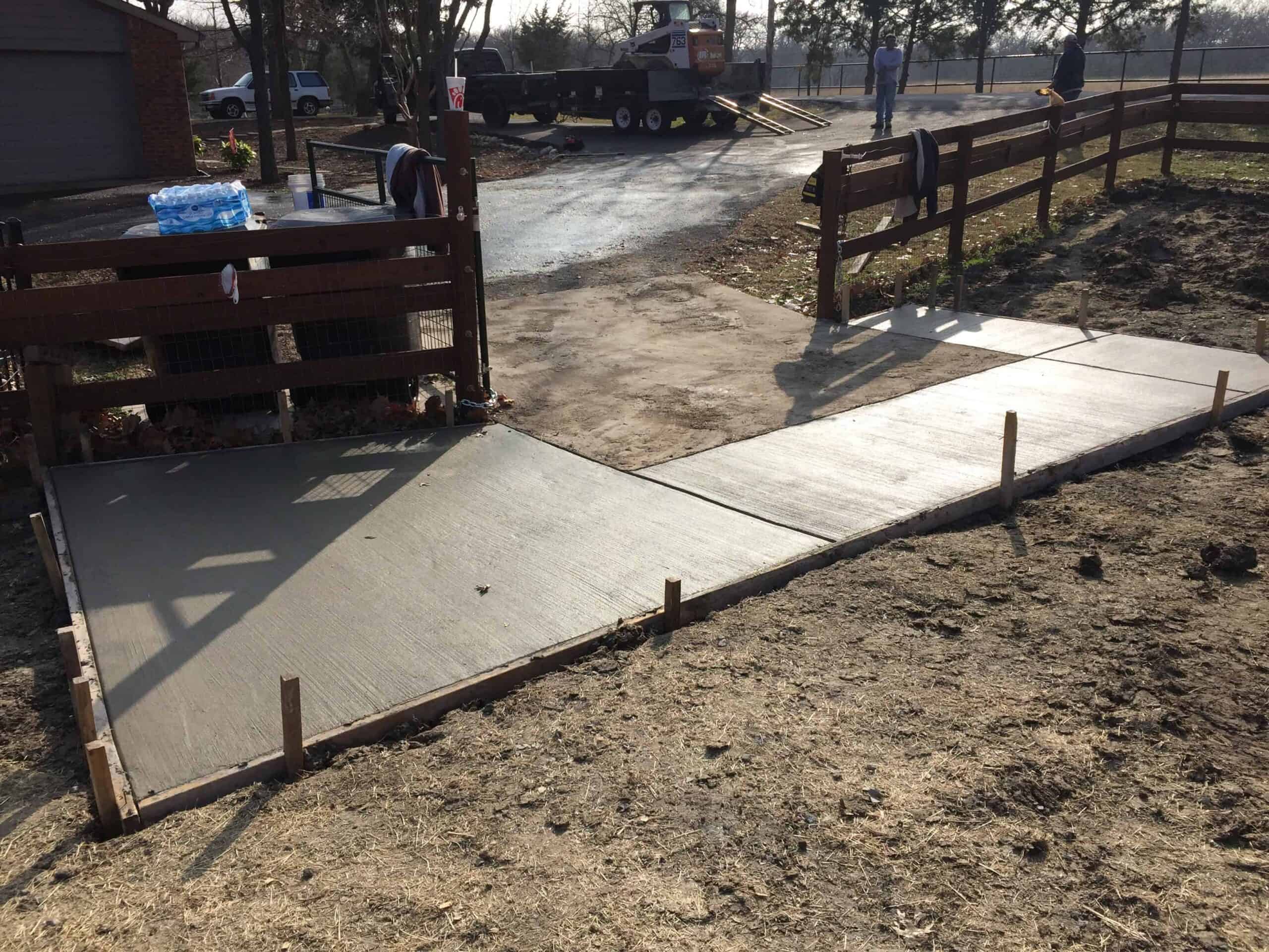 Concrete driveway and leadwalk on equestrian property in Collin County