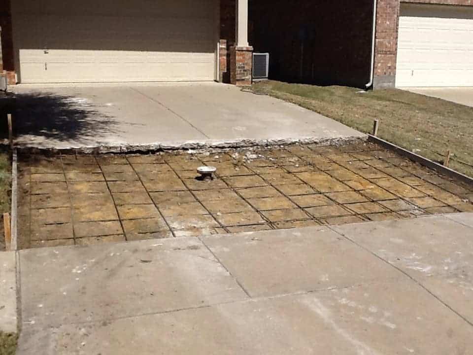 Driveway replacement preparation with rebar in Collin County