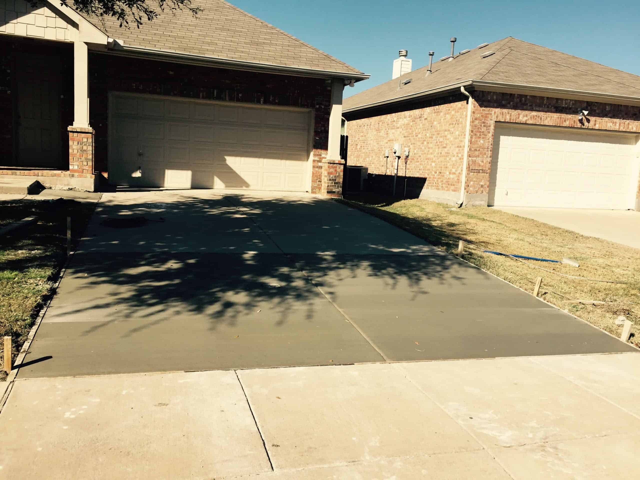 New concrete driveway installation in Plano, Texas