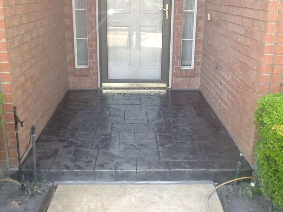 Stamped concrete patio with stone pattern