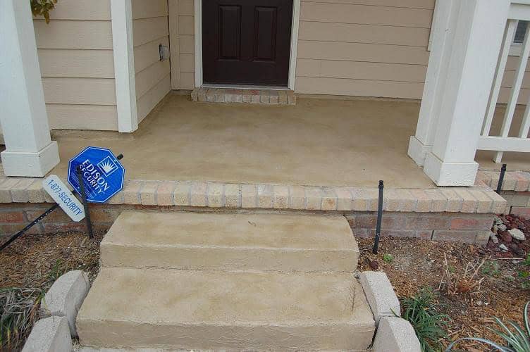 Decorative concrete overlay on front porch and steps