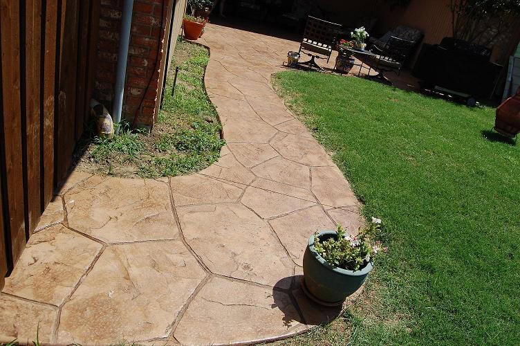 Stamped concrete leadwalk and patio in Collin County
